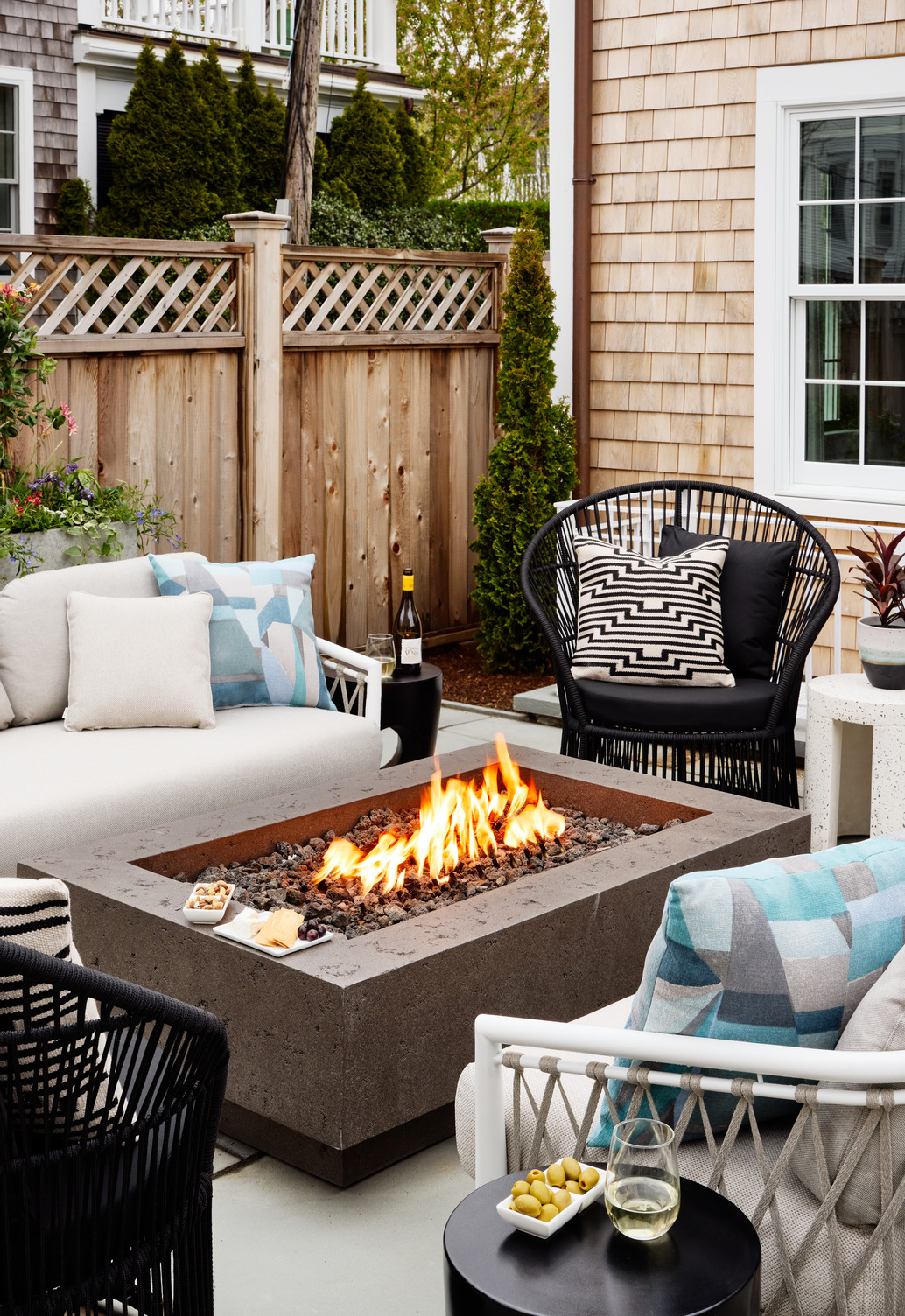 Close up of an outdoor seating area with a firepit at The Edgartown Inn