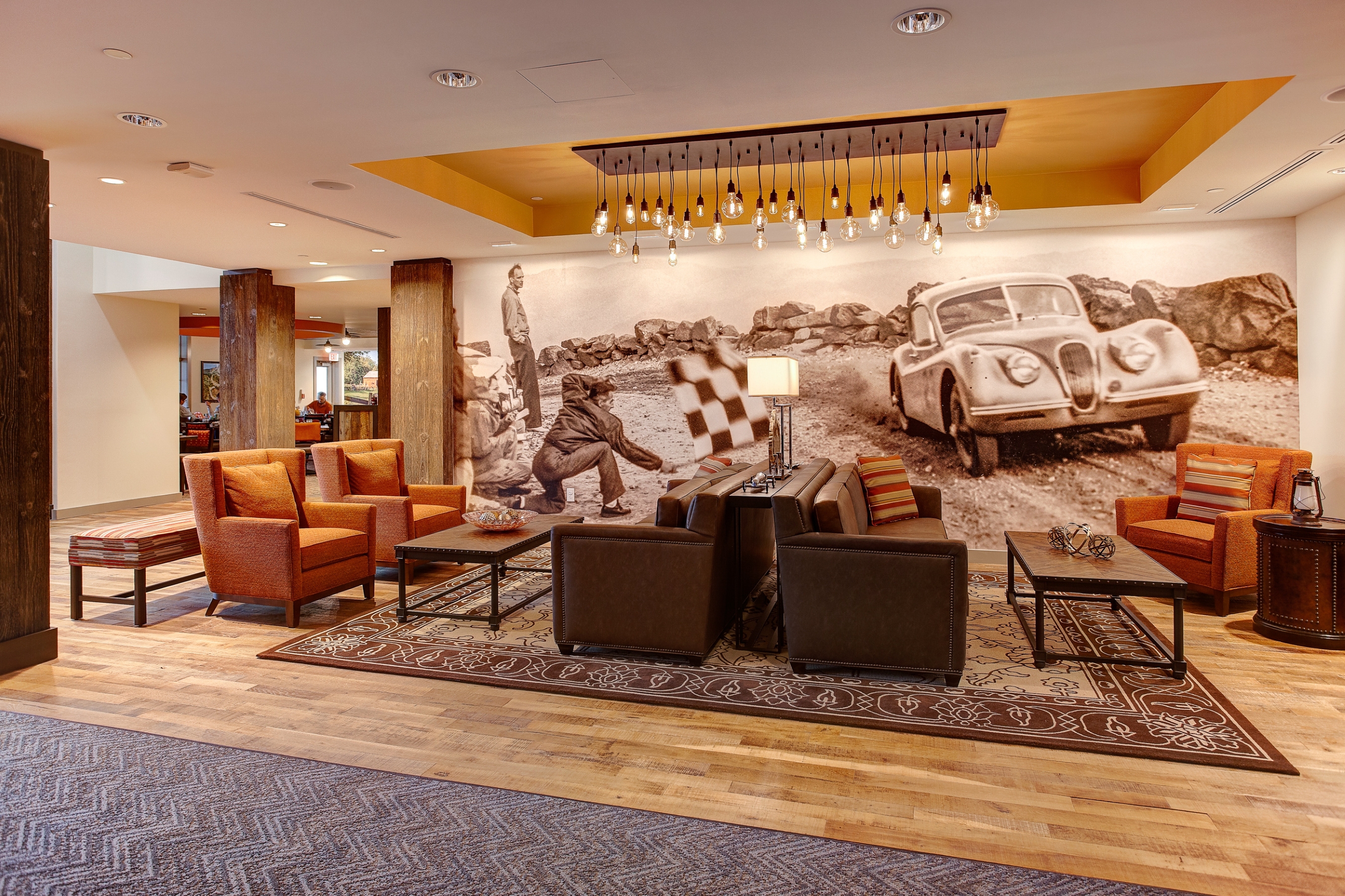 Glen House lobby with wall mural of antique car racing