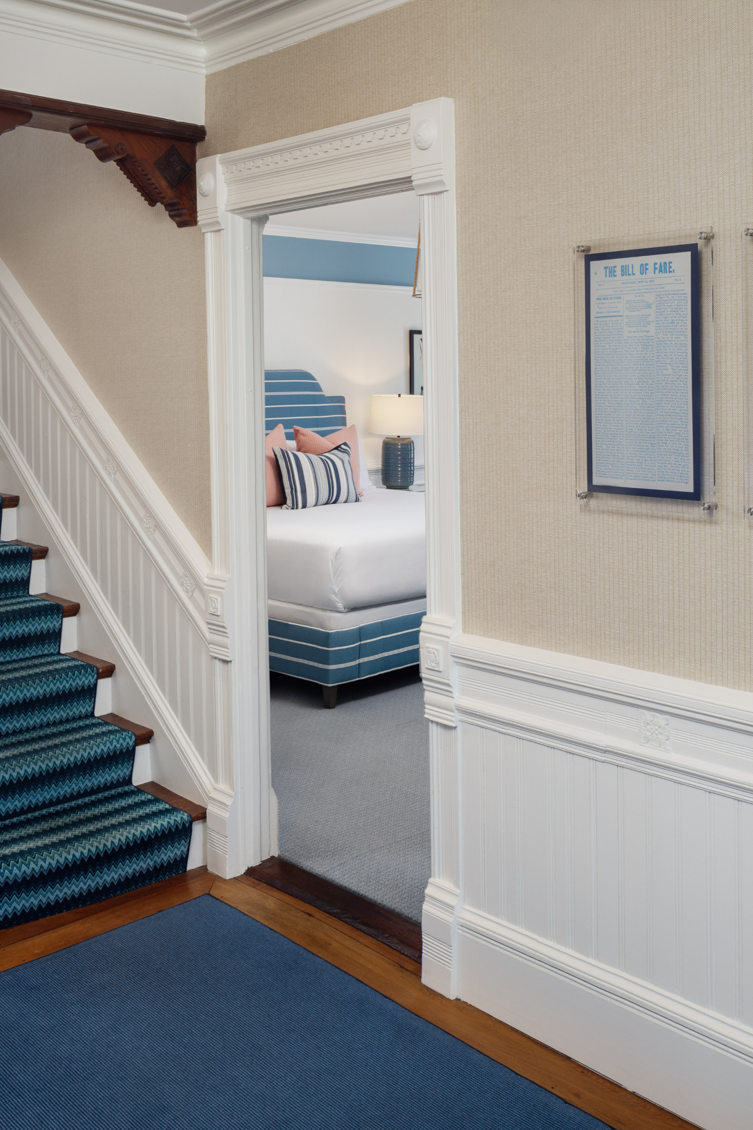 View of a Deluxe King room at 76 Main Ink Press Hotel from the hallway