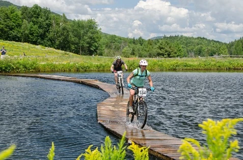 Biking trail over water in The White Mountains